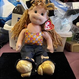 Adorable Plush Doll with Gold Shoes and Checkered Outfit